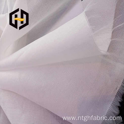 Large roll packing of mesh shoe lining fabric